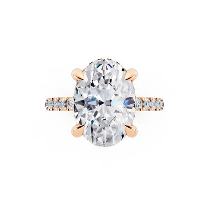 14 KT Rose Gold Oval Cut Diamond Solitaire Ring with Round Pavé Band and Prong Setting - top angle