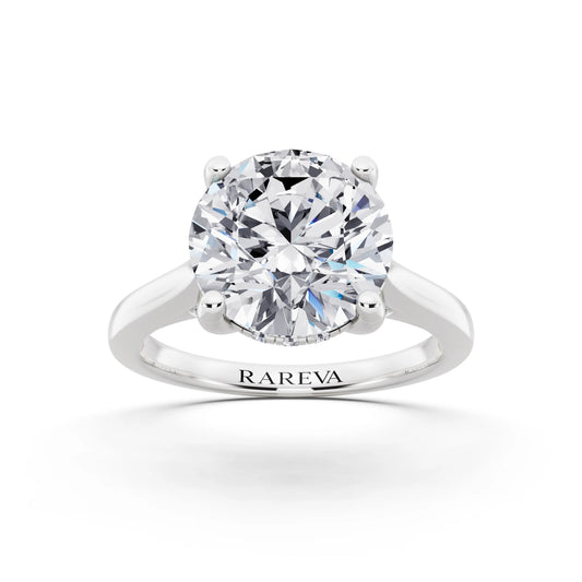 Platinum Round Cut Diamond Solitaire Ring with Cathedral Band - front view