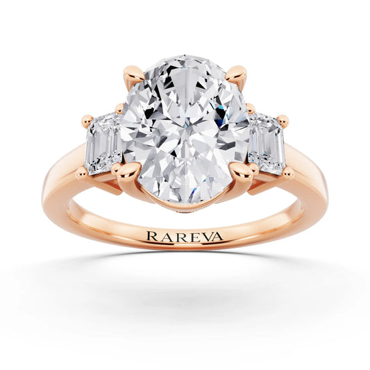 14 KT Rose Gold Oval Cut Diamond Three Stone Emerald Accent Ring - front view