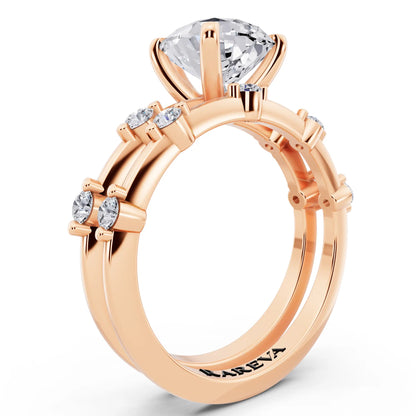 14 KT Rose Gold Pear Cut Diamond Ring with Floating Accent Band - top view