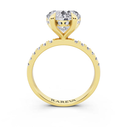 18 KT Yellow Gold Heart Cut Diamond Solitaire Ring with Round Pavé Band and Prong Setting - through finger