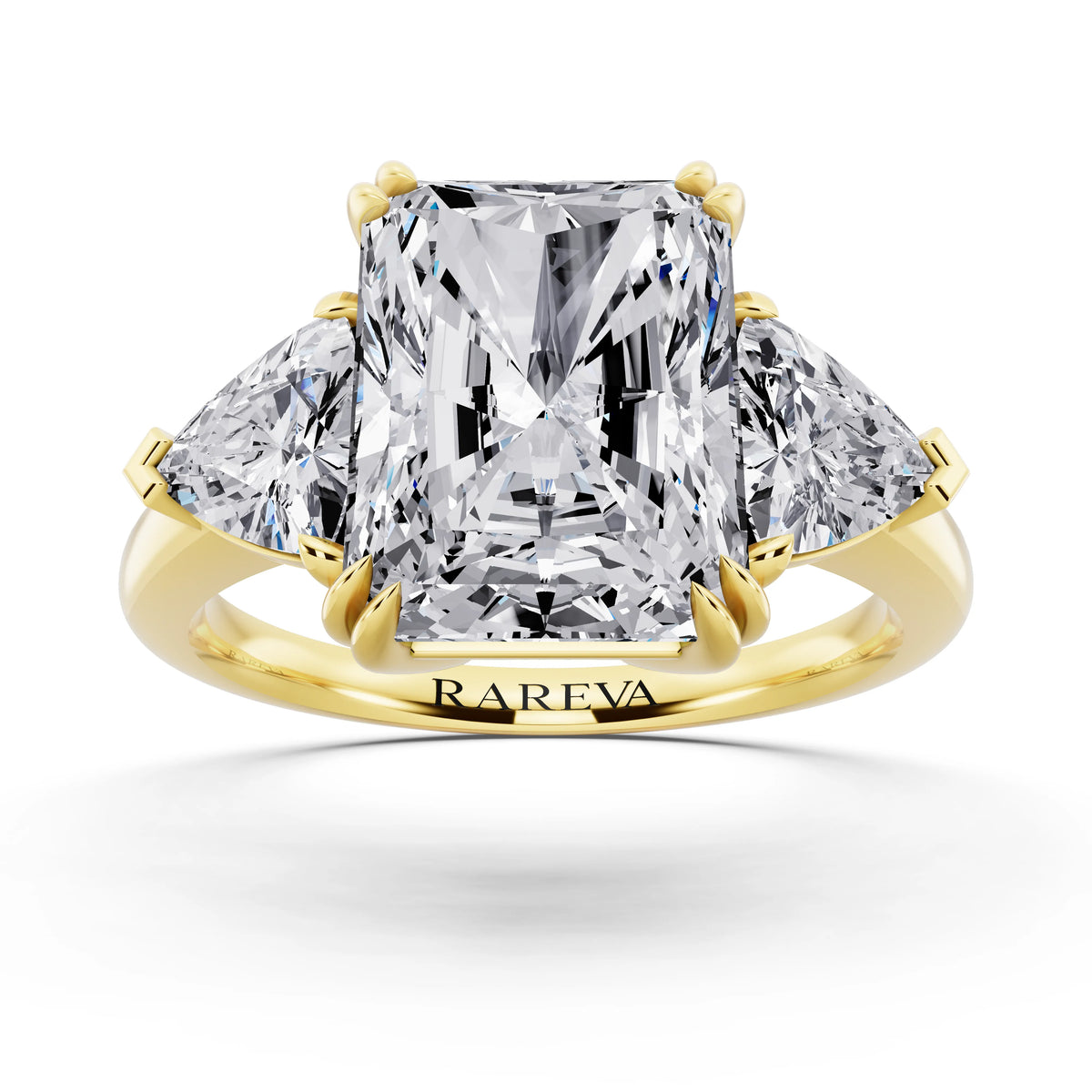 18 KT Yellow Gold Radiant Cut Diamond Three Stone Ring with Trillion Accents - front view
