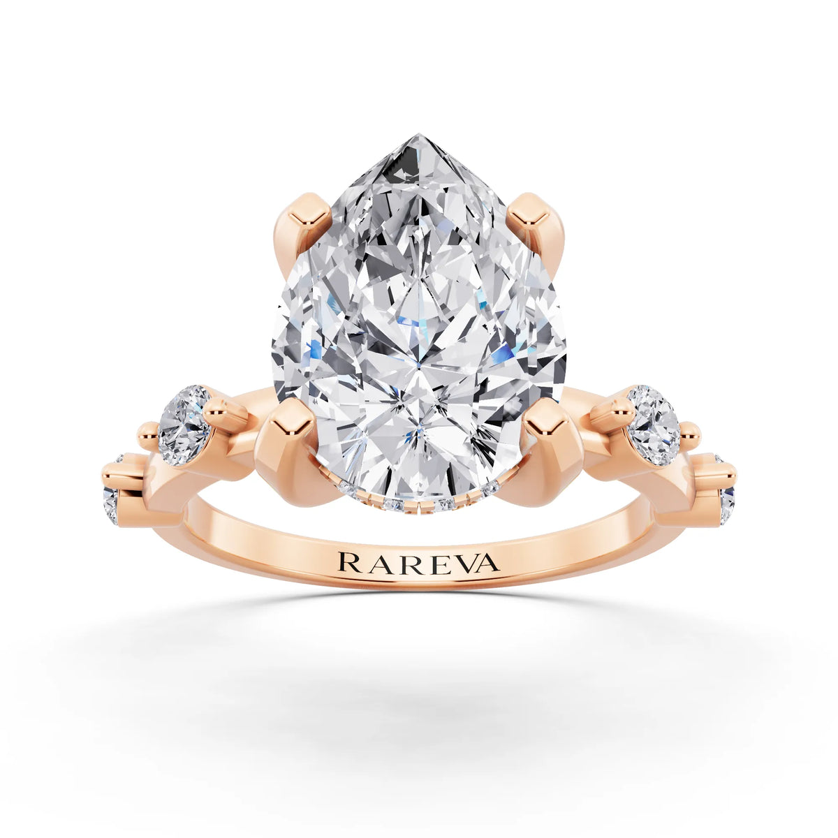 14 KT Rose Gold Pear Cut Diamond Solitaire Ring with Floating Diamond Accents - front view