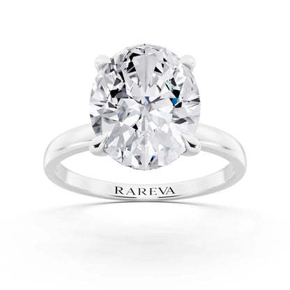 18 KT White Gold Oval Cut Diamond Solitaire Ring with Pave Collar - front view