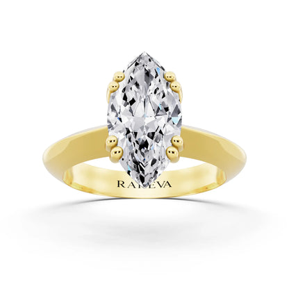 18 KT Yellow Gold Marquise Cut Diamond Solitaire Ring with Knife Edge Band - front view