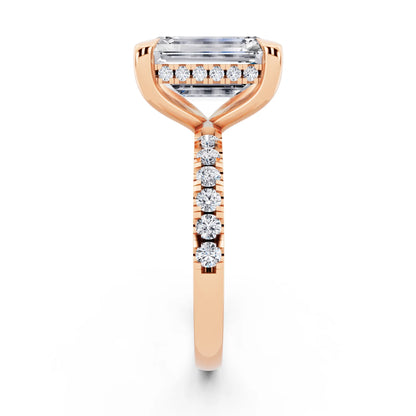 14 KT Rose Gold Emerald Cut Diamond Solitaire Ring with Round Pavé Band and Prong Setting - side view