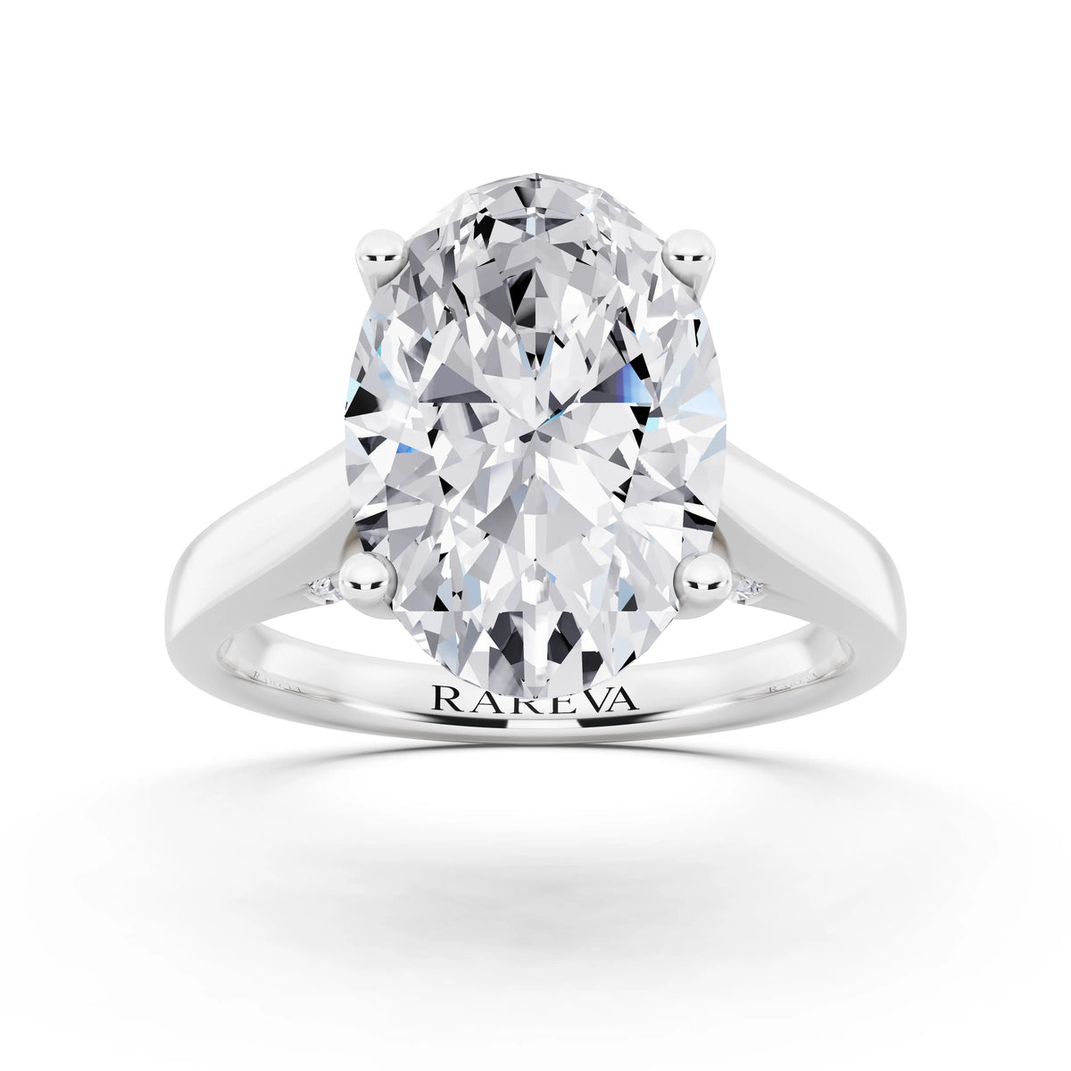Platinum Oval Cut Diamond Solitaire Ring with Hidden Accent - front view