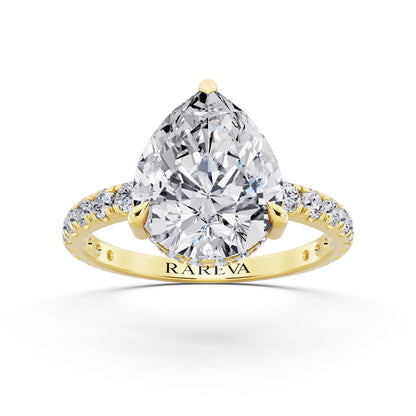 18 KT Yellow Gold Pear Cut Diamond Solitaire Ring with Hidden Halo and French Pave Band - front view