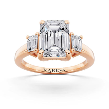 18 KT Rose Gold Emerald Cut Diamond Three Stone Emerald Accent Ring - front view