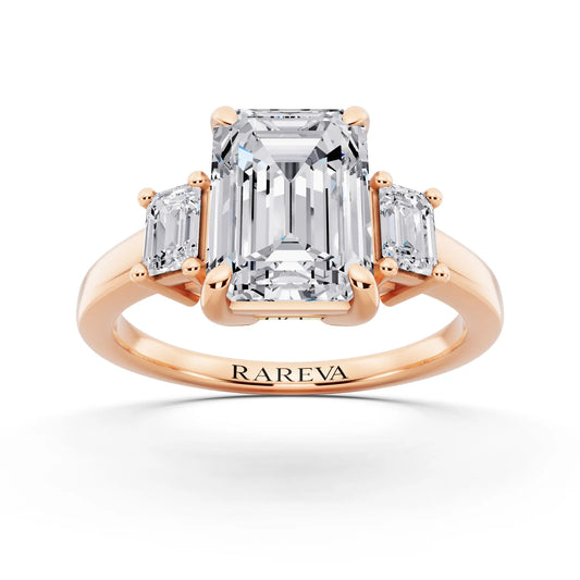 18 KT Rose Gold Emerald Cut Diamond Three Stone Emerald Accent Ring - front view