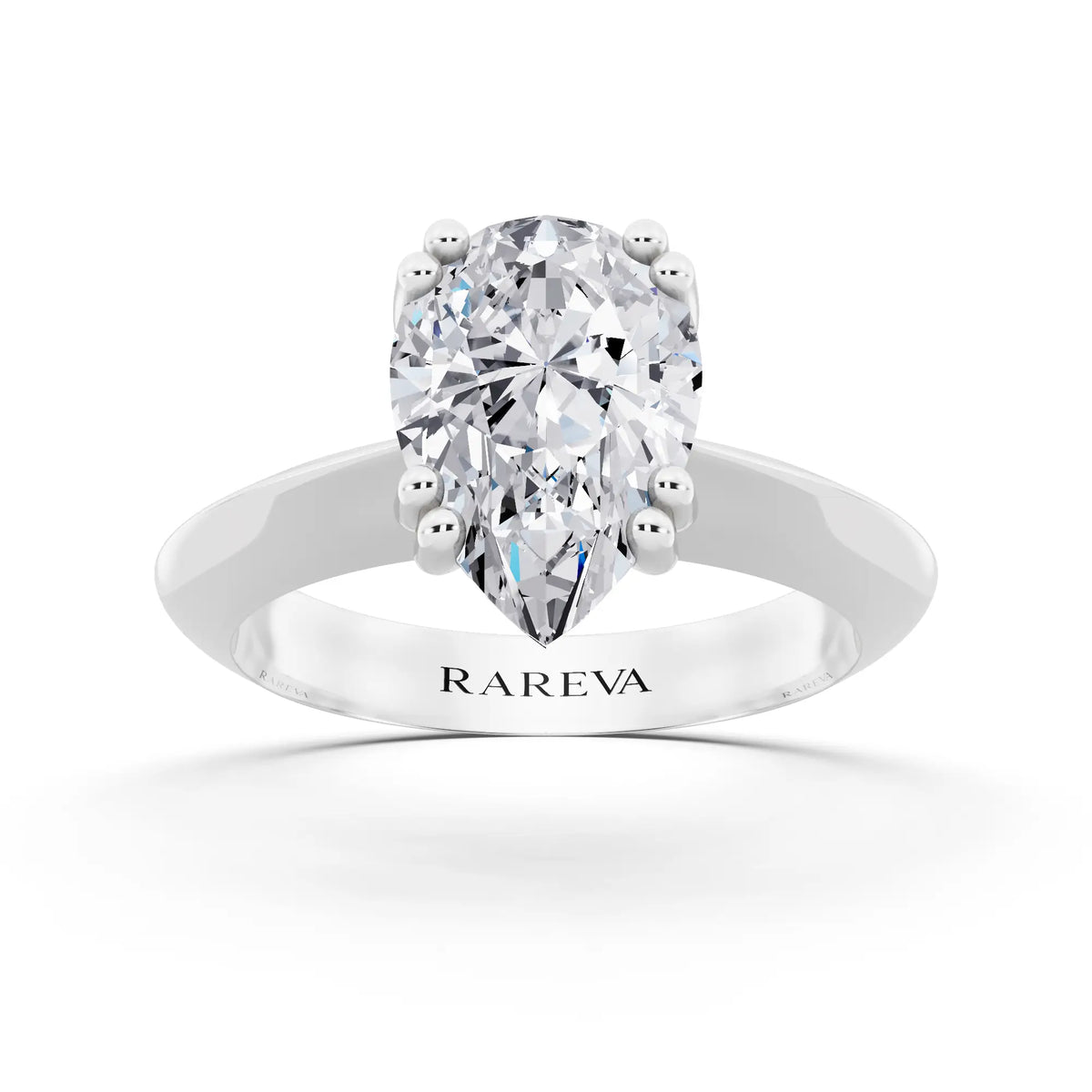 Platinum Pear Cut Diamond Solitaire Ring with Knife Edge Band - front view