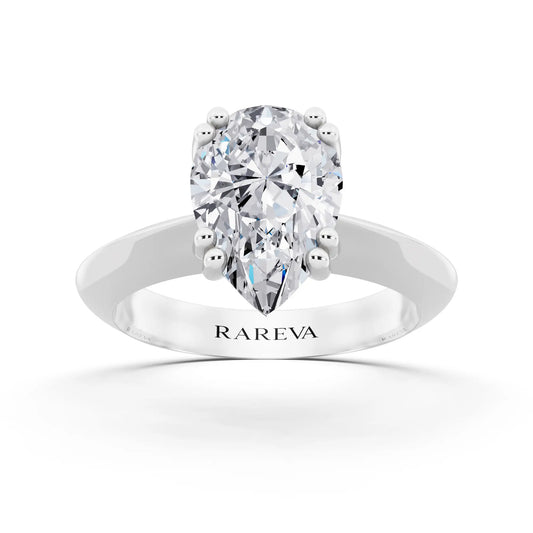 Platinum Pear Cut Diamond Solitaire Ring with Knife Edge Band - front view