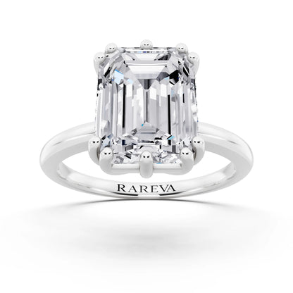 18 KT White Gold Emerald Cut Diamond Solitaire Ring with Hidden Accent Basket - front view