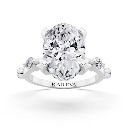 18 KT White Gold Oval Cut Diamond Solitaire Ring with Floating Diamond Accents - front view