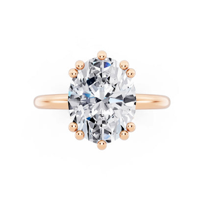 18 KT Rose Gold Oval Cut Diamond Solitaire Ring with Hidden Accent Basket - top angle