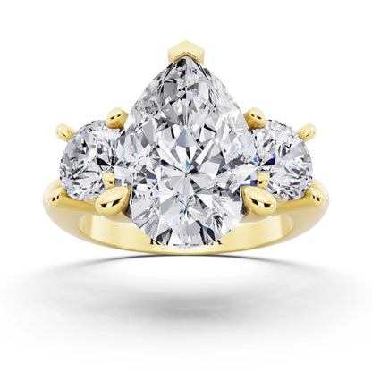 18 KT Yellow Gold Pear Cut Diamond Three Stone Ring with Round Accents - front view