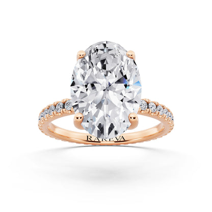 18 KT Rose Gold Oval Cut Diamond Solitaire Ring with Pave Eternity Band - front view