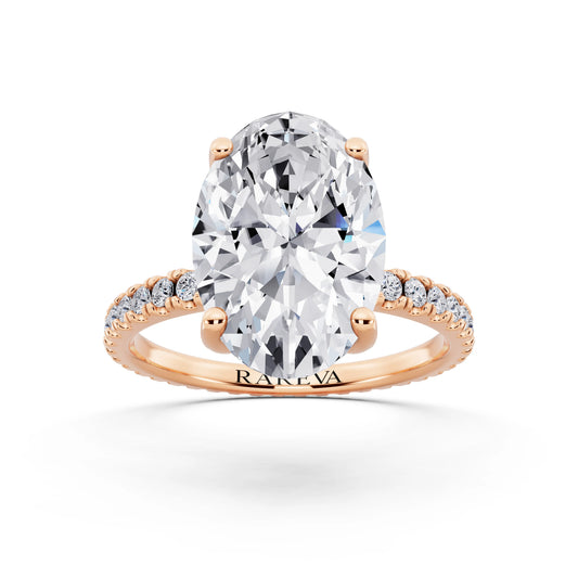 18 KT Rose Gold Oval Cut Diamond Solitaire Ring with Pave Eternity Band - front view