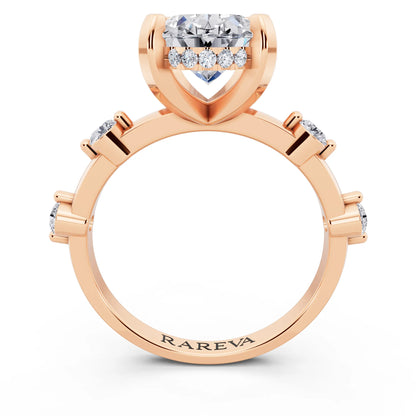 18 KT Rose Gold Oval Cut Diamond Solitaire Ring with Floating Diamond Accents - through finger
