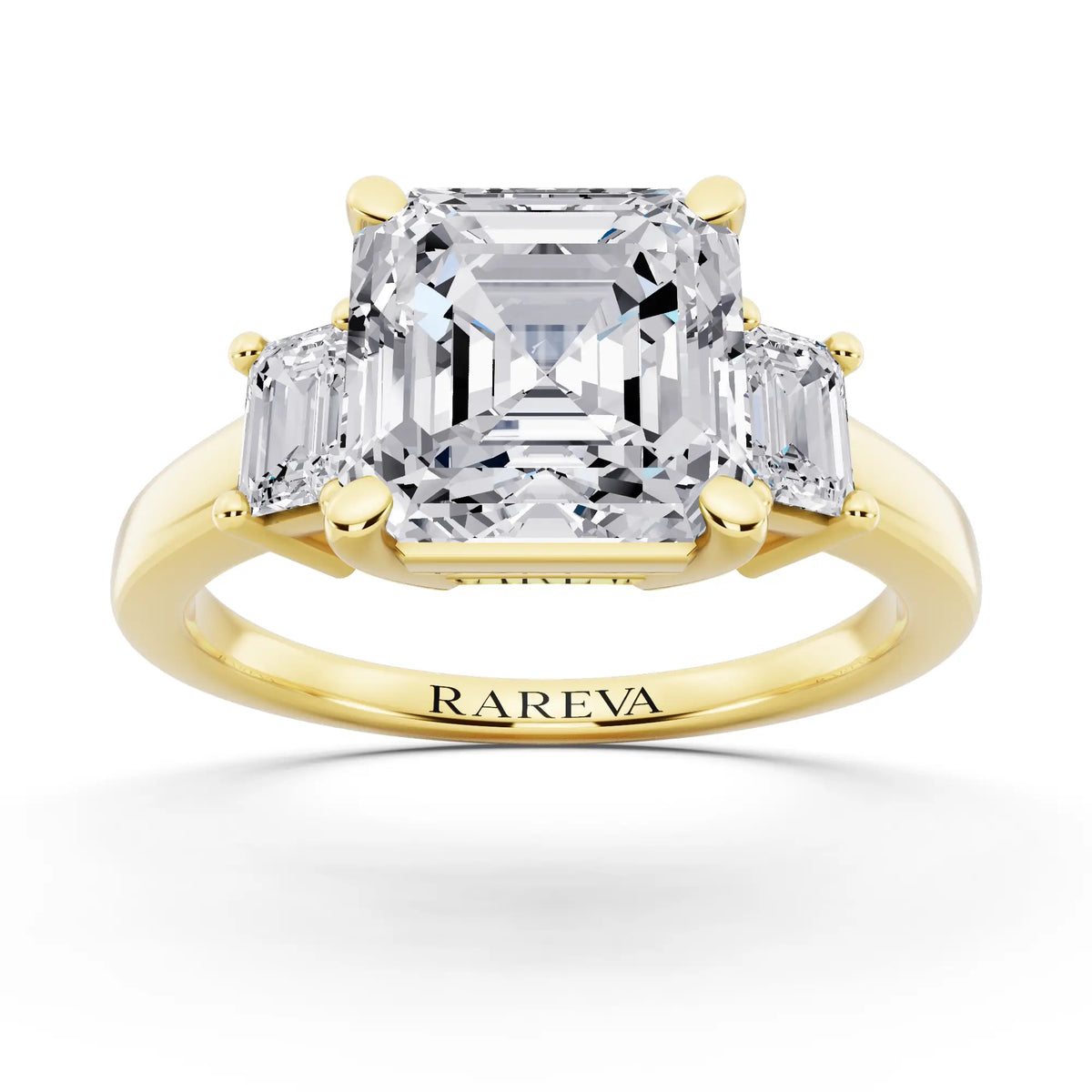 14 KT Yellow Gold Asscher Cut Diamond Three Stone Emerald Accent Ring - front view