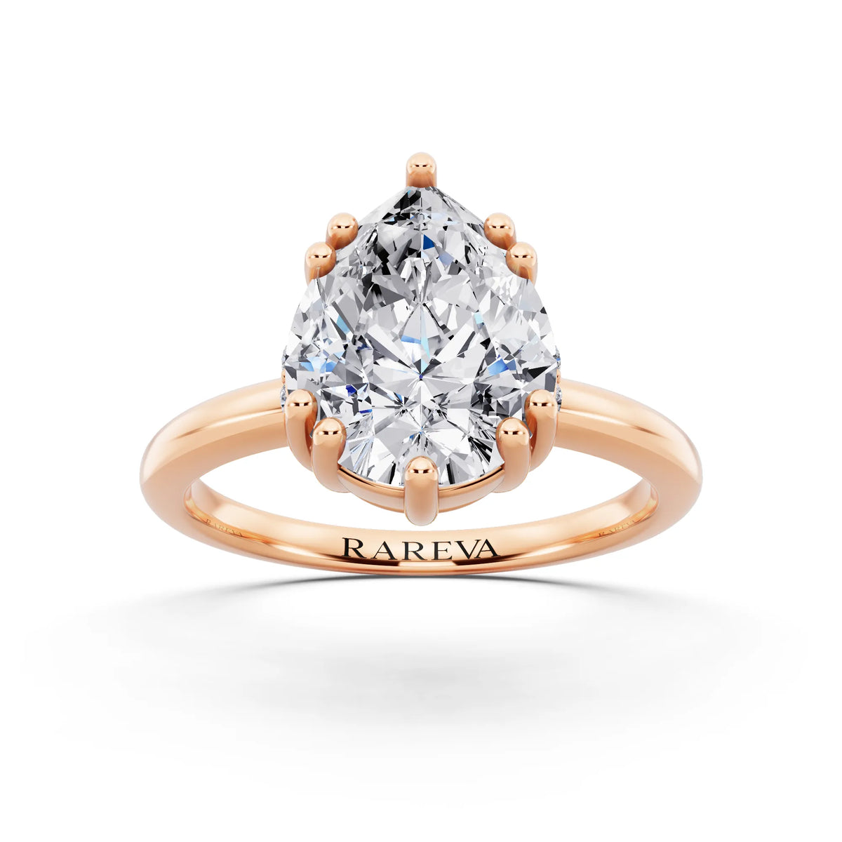18 KT Rose Gold Pear Cut Diamond Solitaire Ring with Hidden Accent Basket - front view