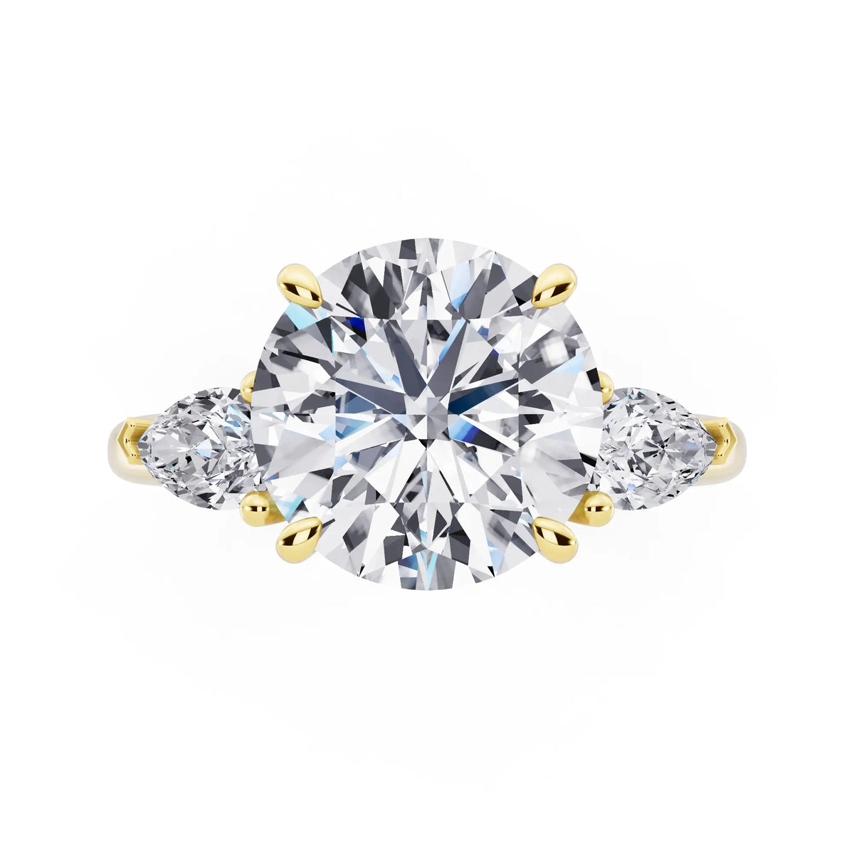 18 KT Yellow Gold Round Cut Diamond Three Stone Pear Accent Ring - top angle
