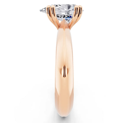 18 KT Rose Gold Pear Cut Diamond Solitaire Ring with Knife Edge Band - side view