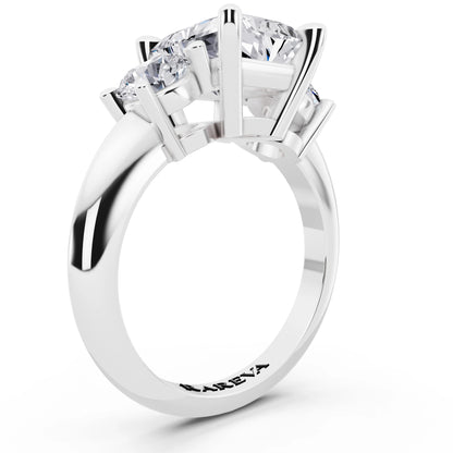Platinum Radiant Cut Diamond Three Stone Ring with Round Accents - top view