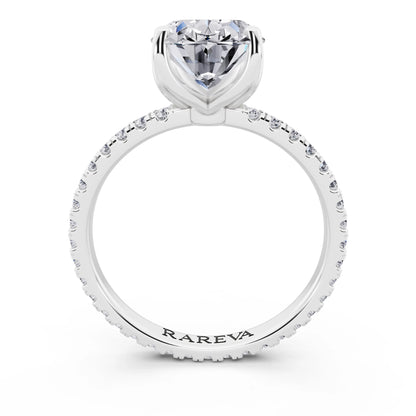 18 KT White Gold Oval Cut Diamond Solitaire Ring with Pave Eternity Band - through finger