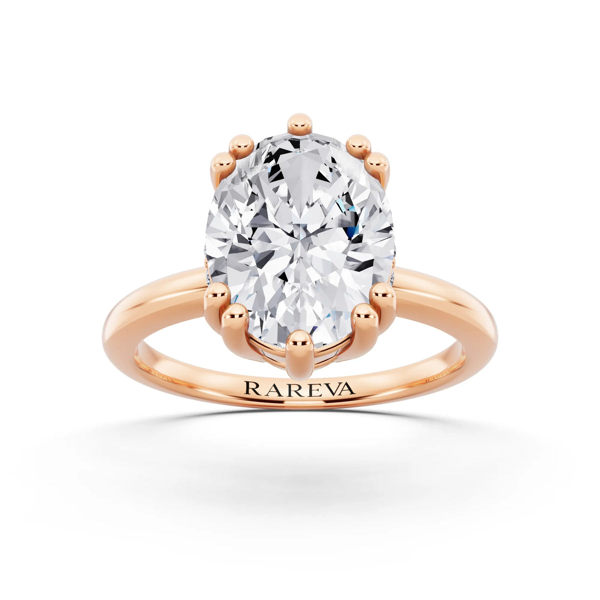 18 KT Rose Gold Oval Cut Diamond Solitaire Ring with Hidden Accent Basket - front view