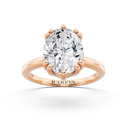 18 KT Rose Gold Oval Cut Diamond Solitaire Ring with Hidden Accent Basket - front view