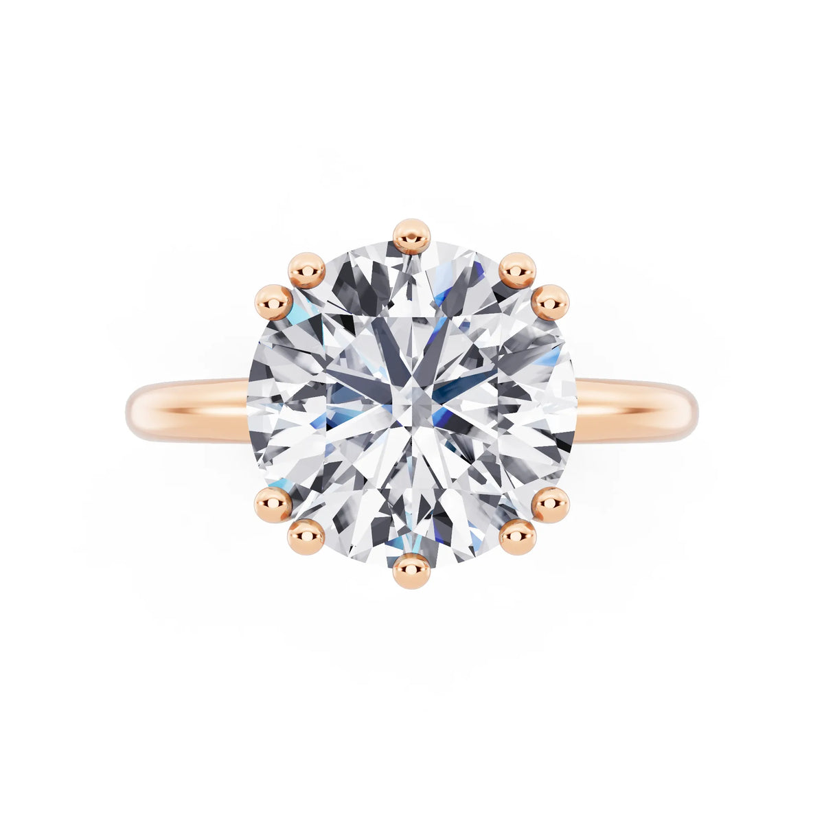 14 KT Rose Gold Round Cut Diamond Solitaire Ring with Hidden Accent Basket - top angle
