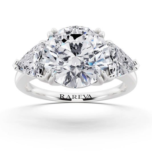Platinum Round Cut Diamond Three Stone Ring with Trillion Accents - front view