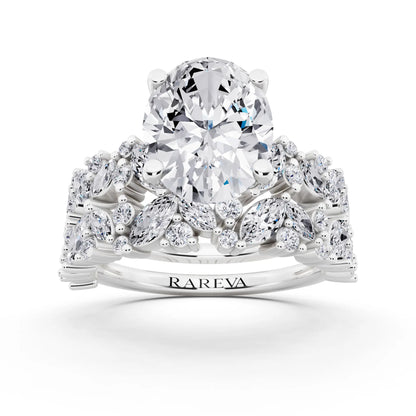 18 KT White Gold Oval Cut Diamond Ring with Marquise Cluster Band - front view