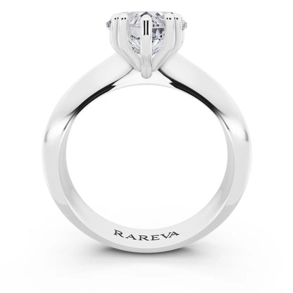 Platinum Heart Cut Diamond Solitaire Ring with Knife Edge Band - through finger