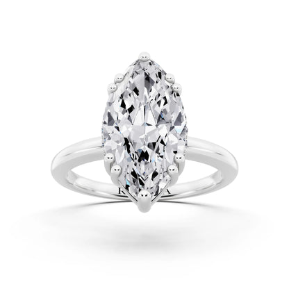 14 KT White Gold Marquise Cut Diamond Solitaire Ring with Hidden Accent Basket - front view