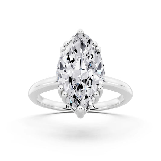 14 KT White Gold Marquise Cut Diamond Solitaire Ring with Hidden Accent Basket - front view