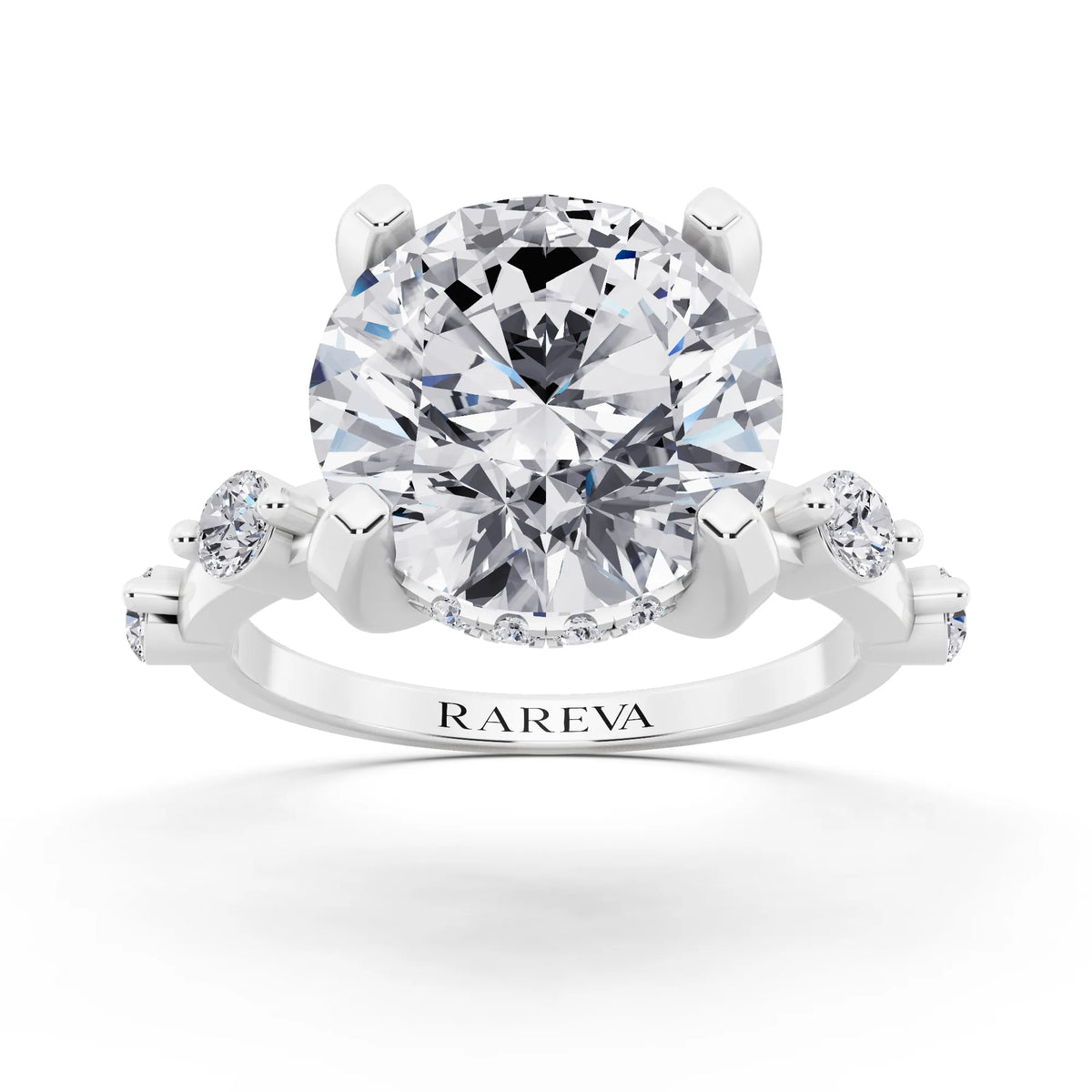 18 KT White Gold Round Cut Diamond Solitaire Ring with Floating Diamond Accents - front view