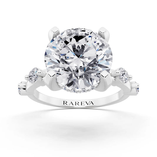 18 KT White Gold Round Cut Diamond Solitaire Ring with Floating Diamond Accents - front view