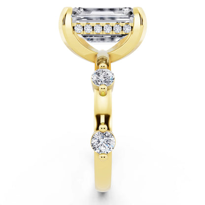 14 KT Yellow Gold Emerald Cut Diamond Solitaire Ring with Floating Diamond Accents - side view
