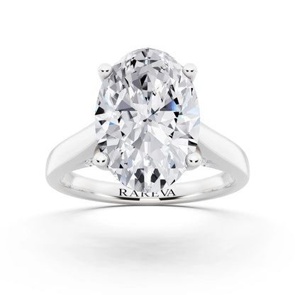 14 KT White Gold Oval Cut Diamond Solitaire Ring with Hidden Accent - front view