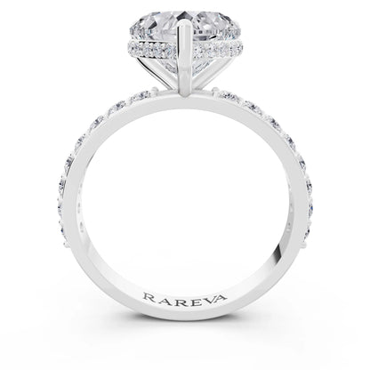 18 KT White Gold Heart Cut Diamond Solitaire Ring with Hidden Halo and Pave Band - through finger