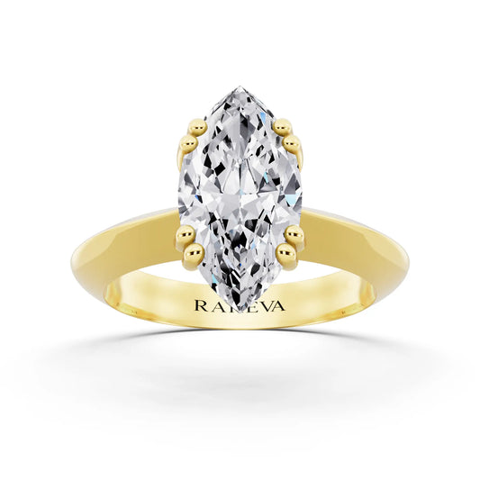 14 KT Yellow Gold Marquise Cut Diamond Solitaire Ring with Knife Edge Band - front view