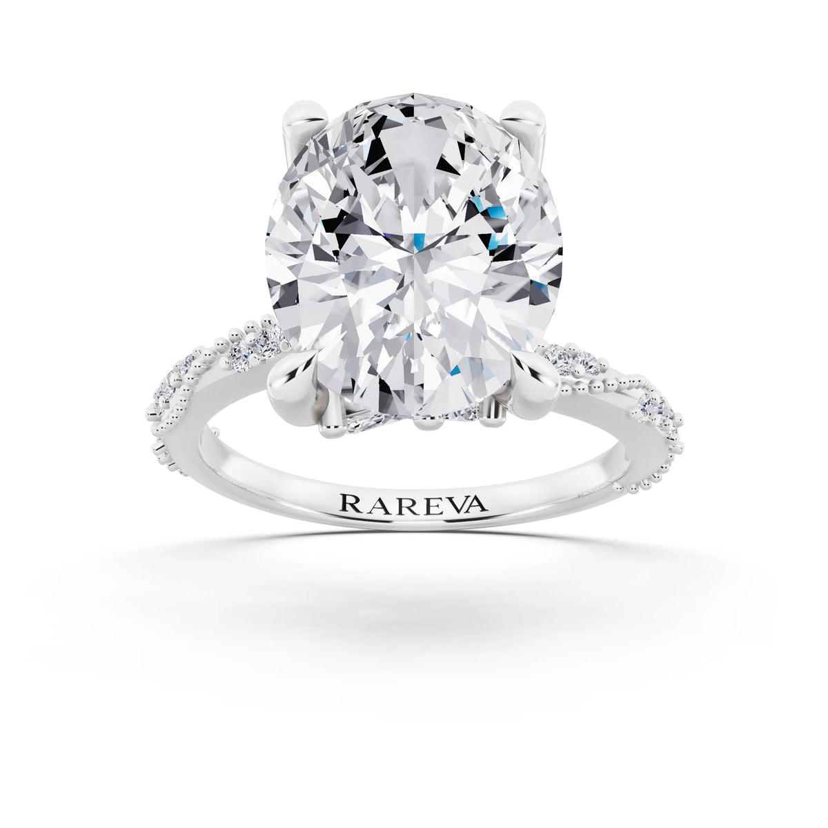 18 KT White Gold Oval Cut Diamond Ring with Marquise Accent - front view