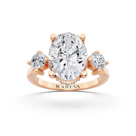 18 KT Rose Gold Oval Cut Diamond Three Stone Engagement Ring with Hidden Halo - front view