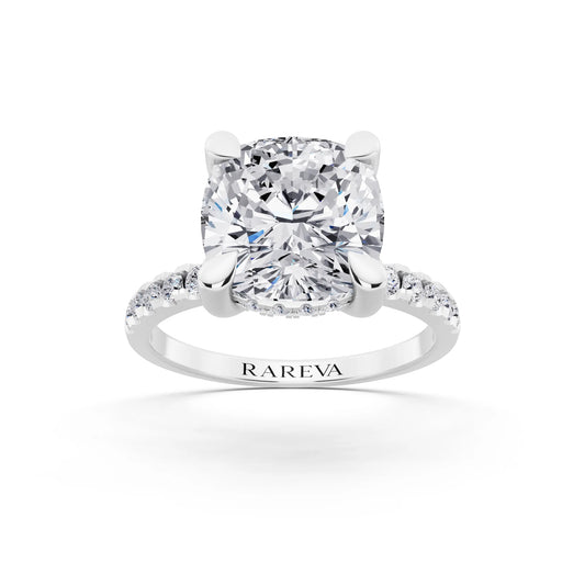 18 KT White Gold Cushion Cut Diamond Solitaire Ring with Round Pavé Band and Prong Setting - front view