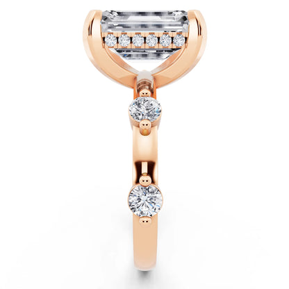 18 KT Rose Gold Emerald Cut Diamond Solitaire Ring with Floating Diamond Accents - side view