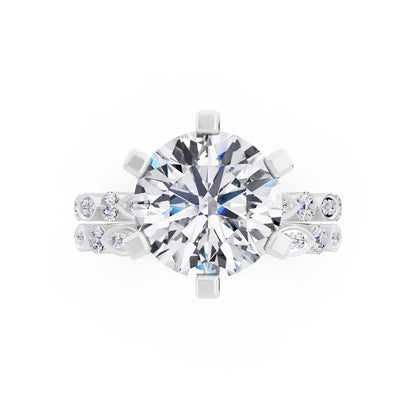 Platinum Round Cut Diamond Solitaire Ring with Marquise Motif Band - Top down