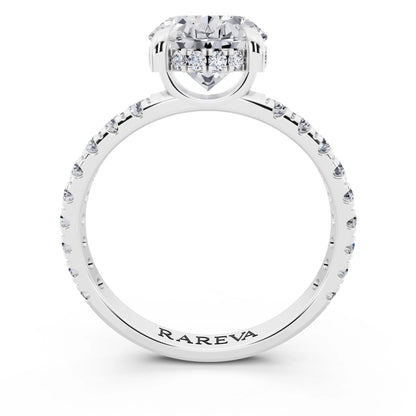 14 KT White Gold Oval Cut Diamond Solitaire Ring with Hidden Halo and French Pave Band - through finger