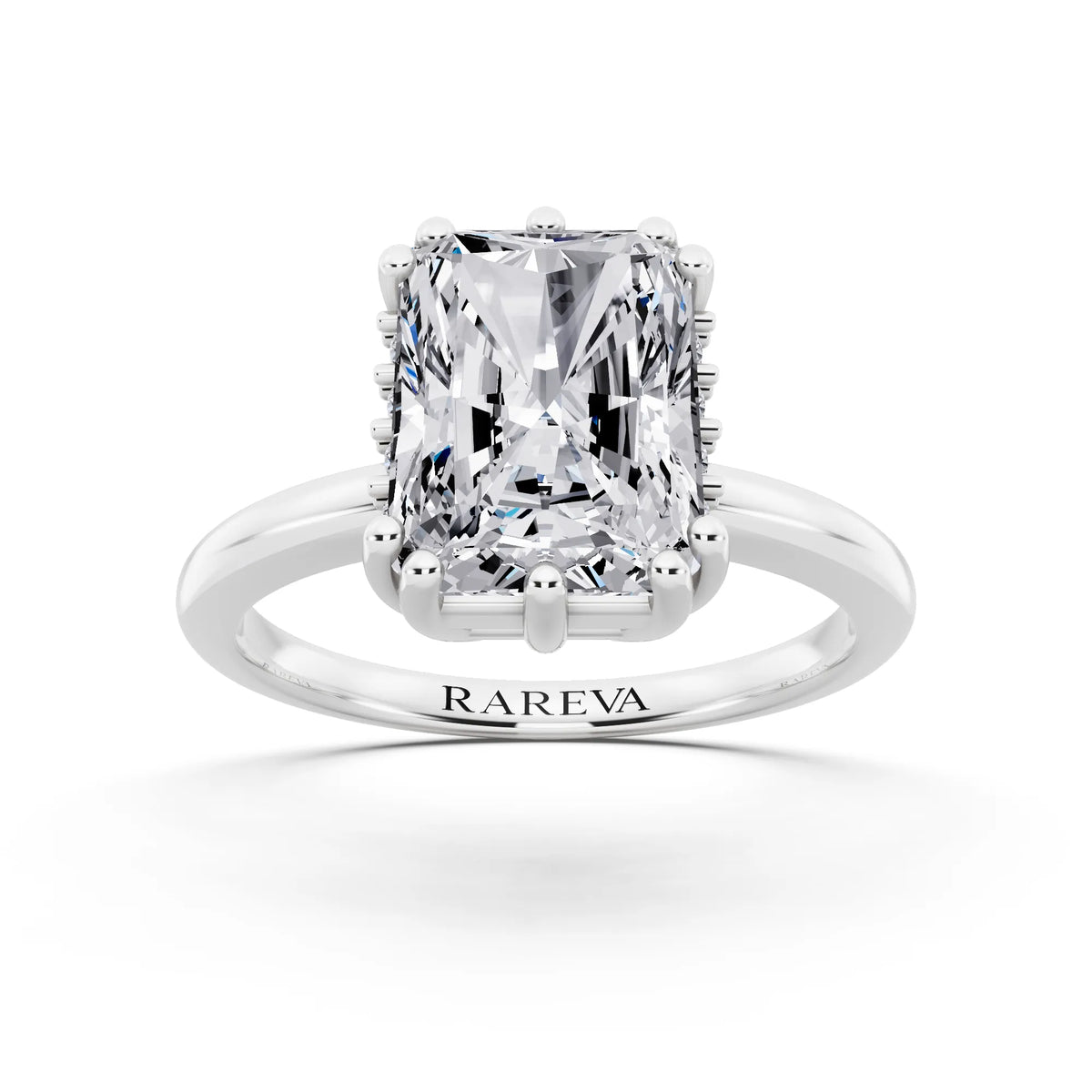 18 KT White Gold Radiant Cut Diamond Solitaire Ring with Hidden Accent Basket - front view